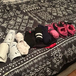Youth soccer cleats, shin guards, and socks